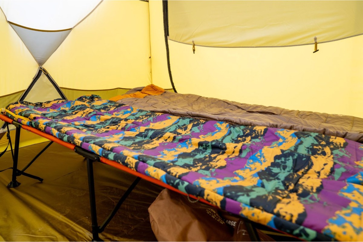 two synthetic camping sleeping bags set up inside an rei tent in colorado while testing